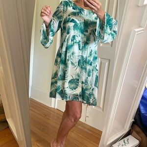 Aura white dress with big green leaves